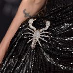 Scorpion jewellery on dress